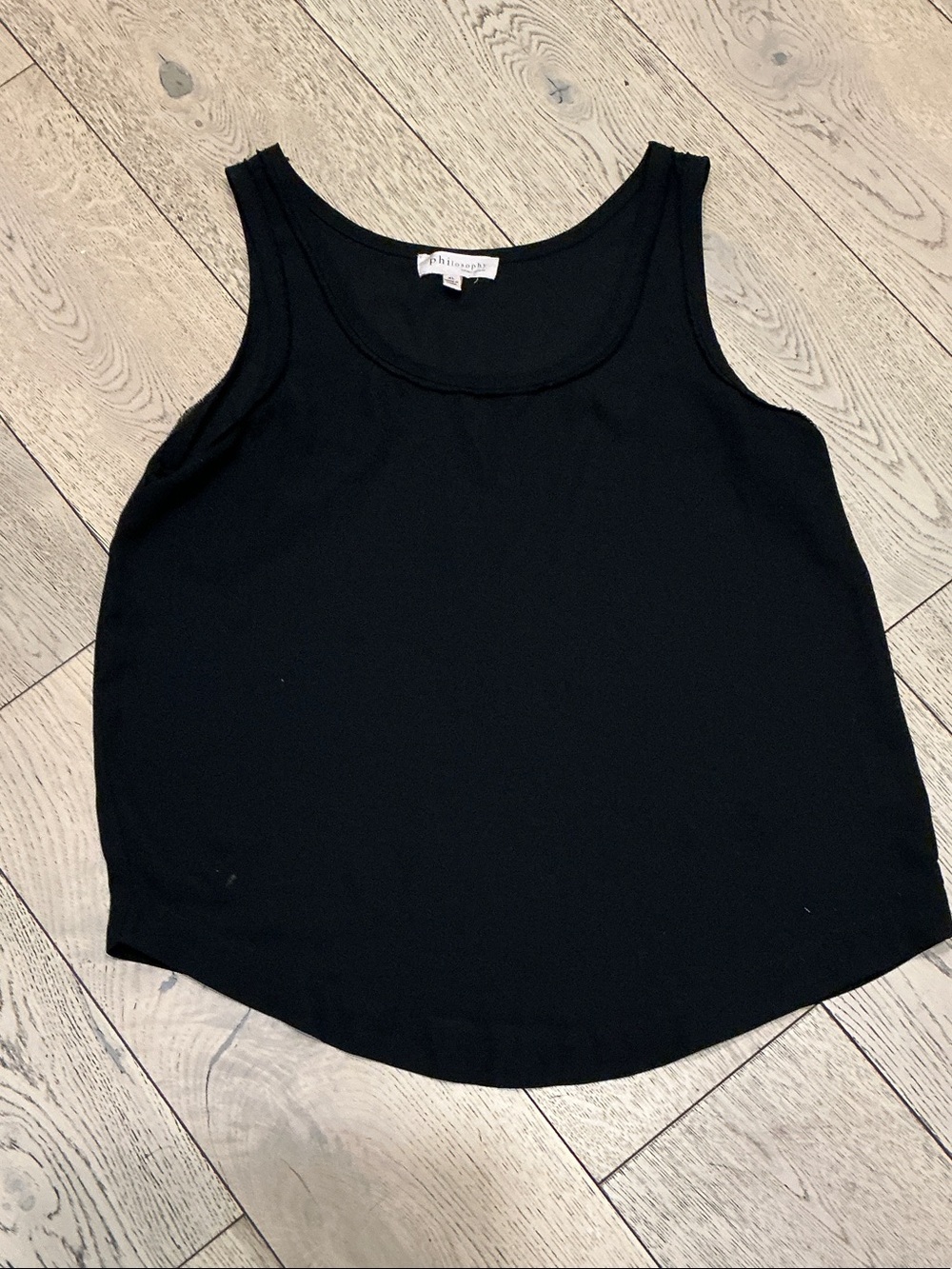 Woman’s Philosophy black tank top. XL. Curved bottom. Like new!